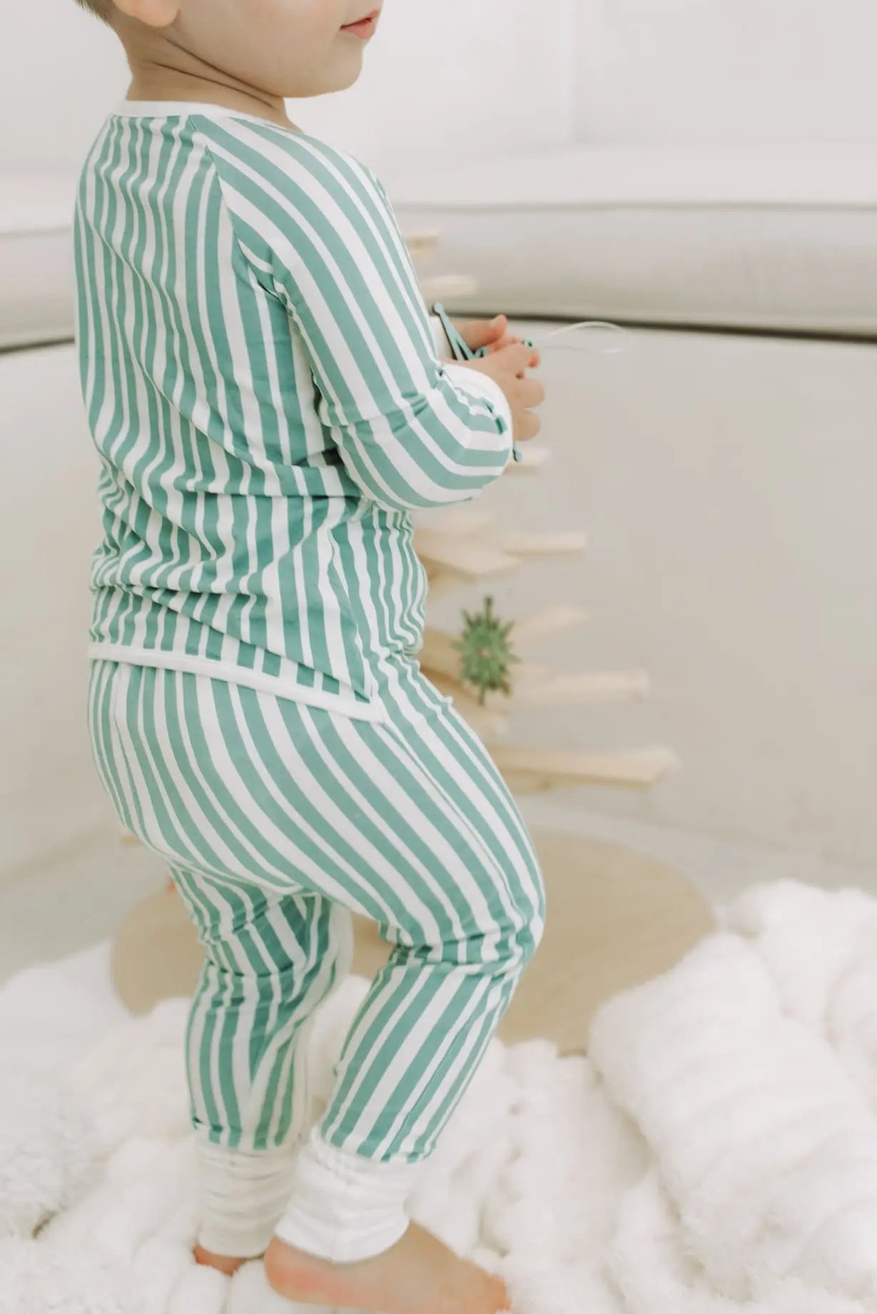 holiday baby sleeper flat lay
