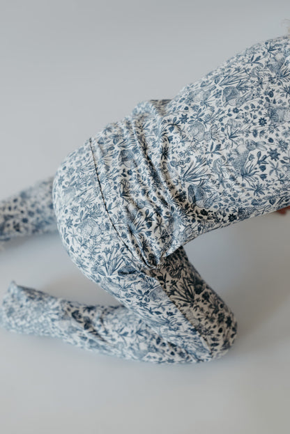 happy easter baby pajamas flat lay