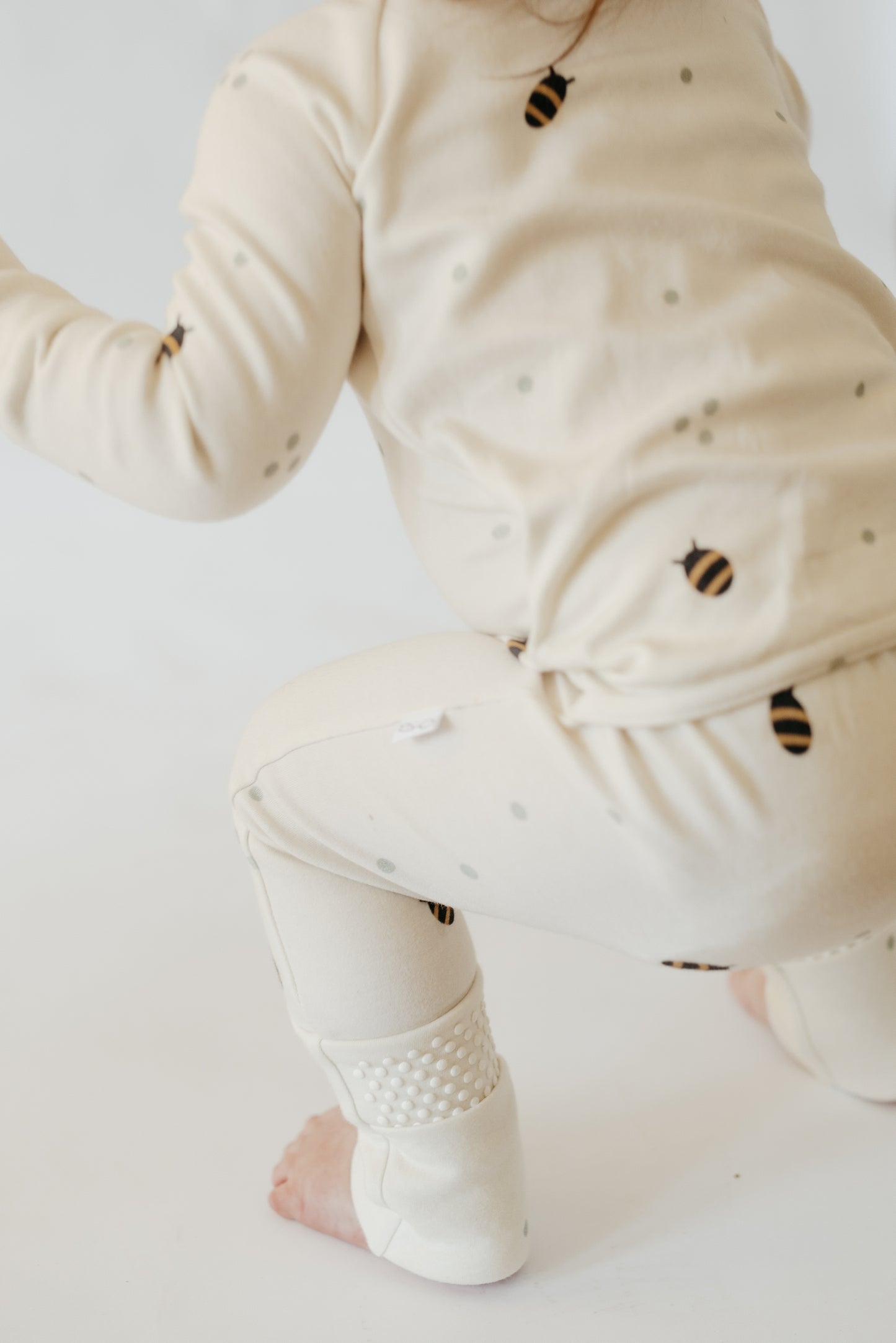 LURE by Lina Diaper Peek-a-Boo sleeper — soft cotton baby pajamas with two-way zipper and convertible feet, perfect for boys or girls