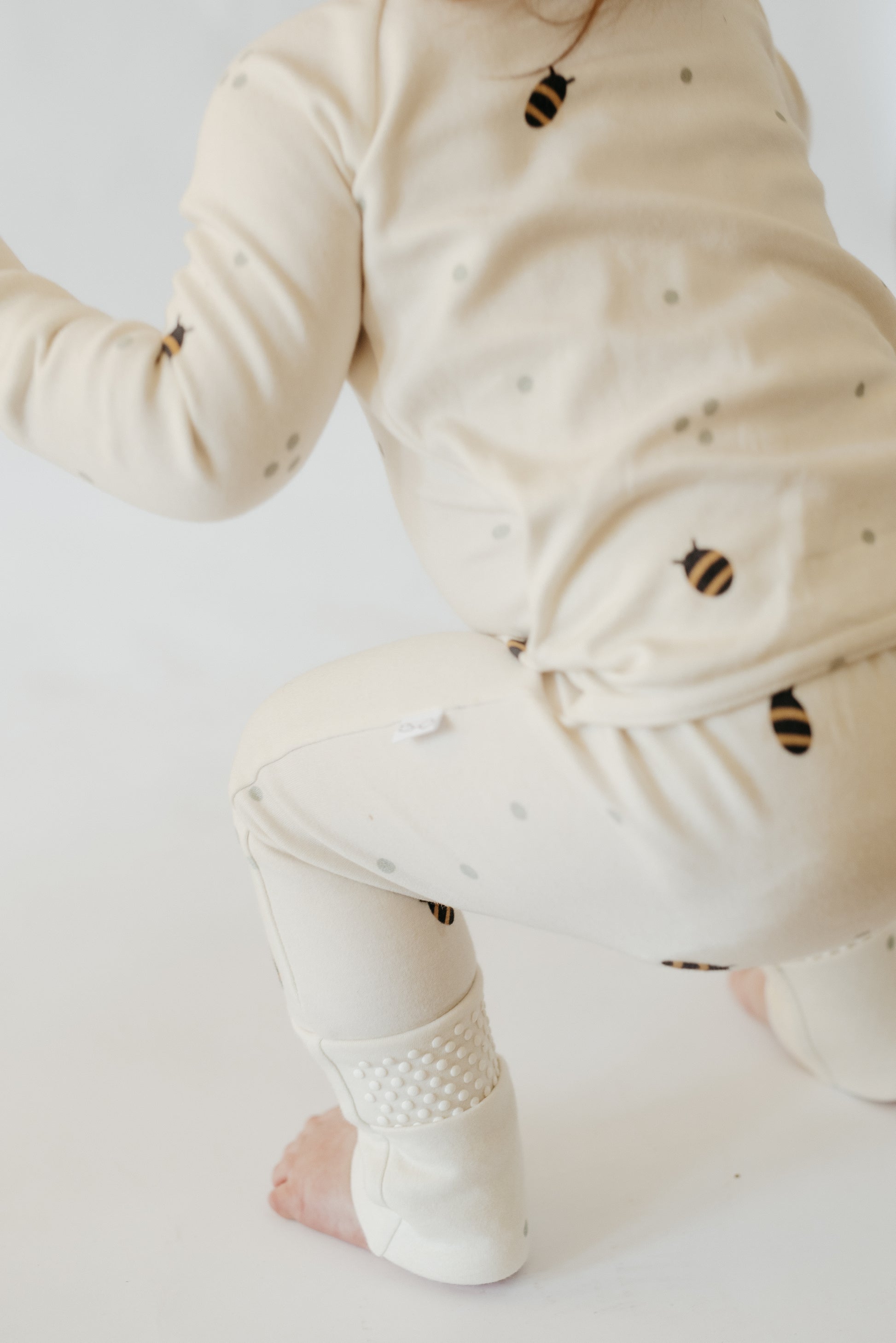 LURE by Lina Diaper Peek-a-Boo sleeper — soft cotton baby pajamas with two-way zipper and convertible feet, perfect for boys or girls