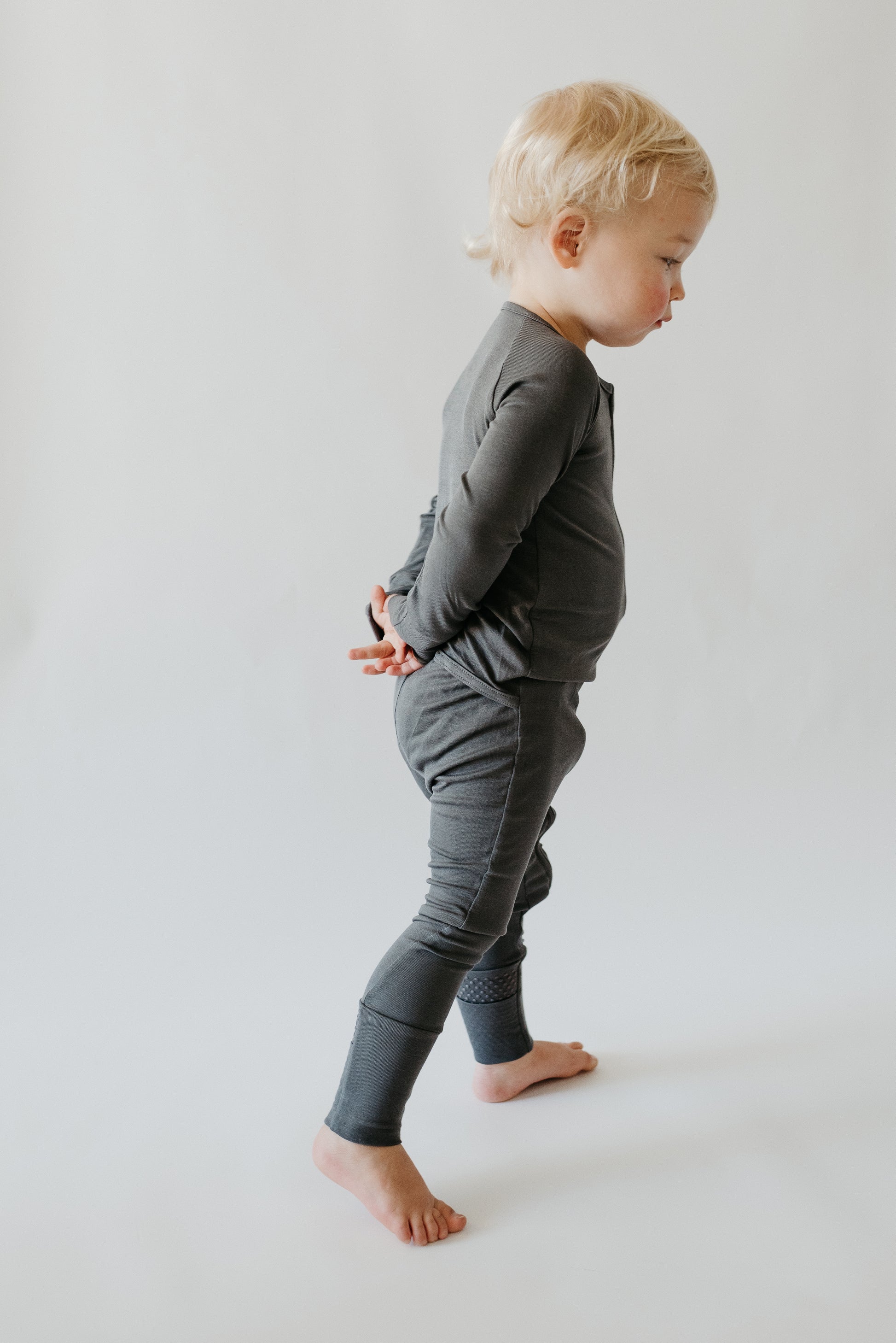 LURE by Lina — Essentials baby sleepwear in Charcoal color —neutral solid with Diaper Peek-a-Boo and convertible cuffs