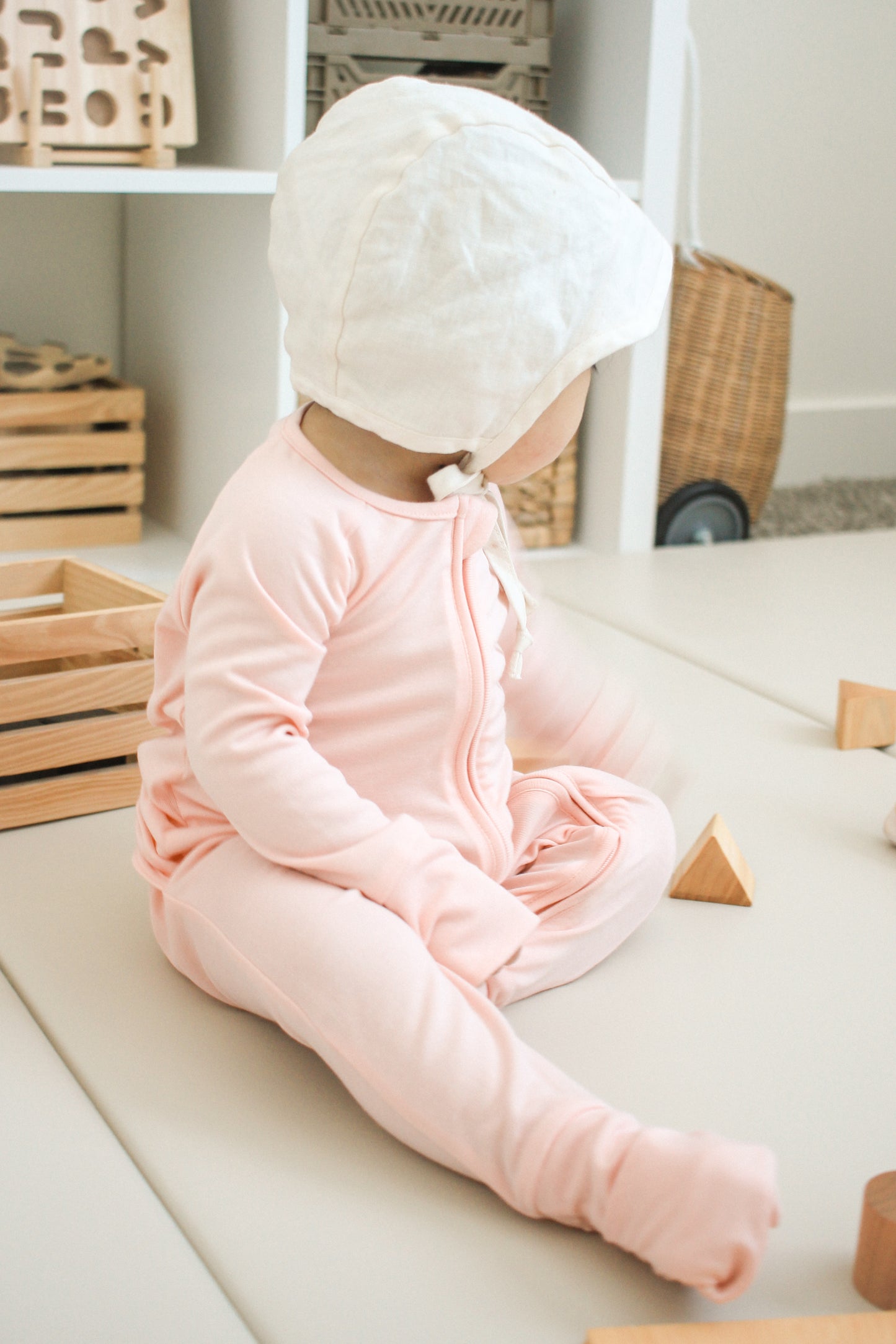 Pink Paradise Essentials—double-stitched neckline + convertible hands & feet (feature detail), LURE by Lina