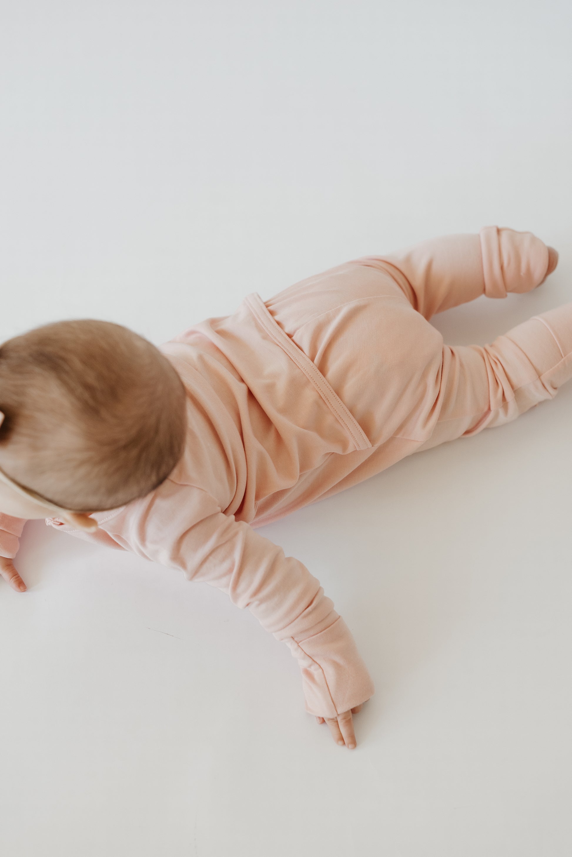 LURE by Lina — Essentials baby zip footie in Pink Paradise—soft solid baby girls color with Diaper Peek-a-Boo 