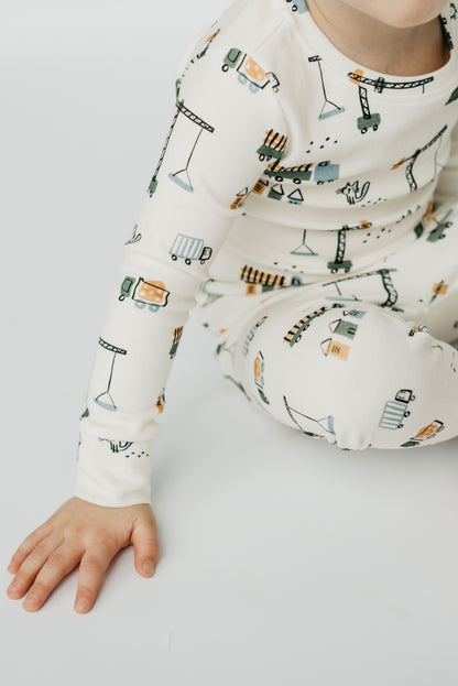 LURE by Lina Meow Construction baby sleeper featuring cats, plaid, and construction trucks — soft cotton blend pajamas with Diaper Peek-a-Boo design