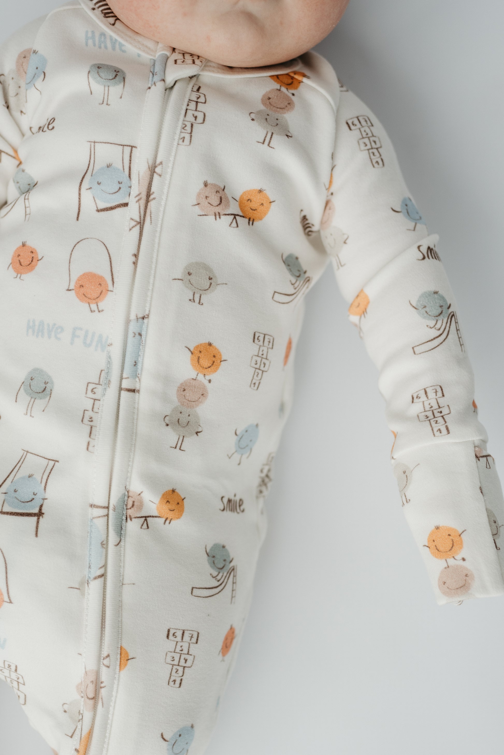 Play Time cotton baby sleeper with Diaper Peek-a-Boo opening and convertible feet — soft, breathable, eco-friendly baby pajamas by LURE by Lina