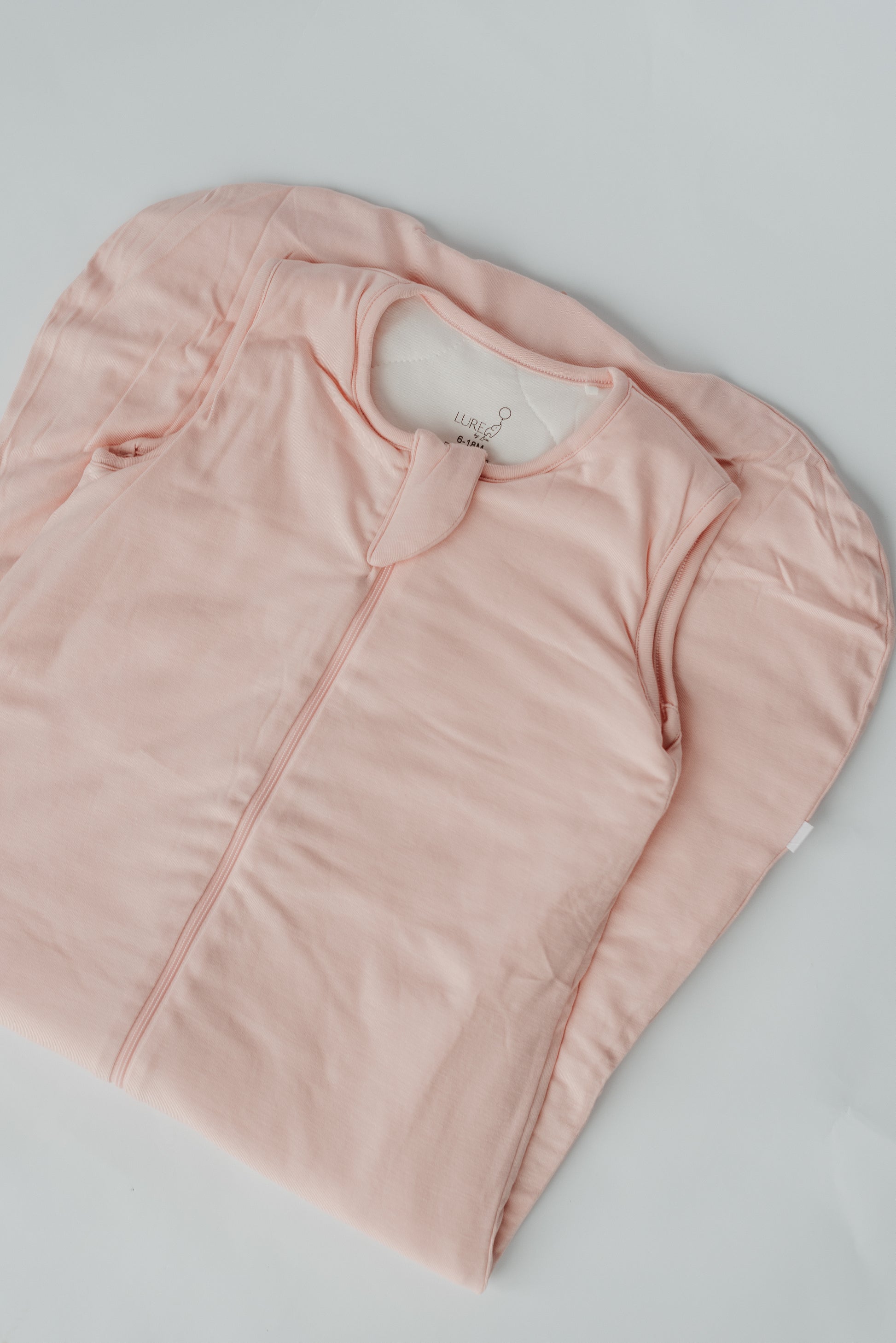 LURE by Lina Sleep Bag in Pink Paradise — luxuriously soft bamboo baby sleep sack with double zipper and 1.0 TOG warmth for all seasons